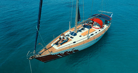 Skippered sailboat in Cyclades